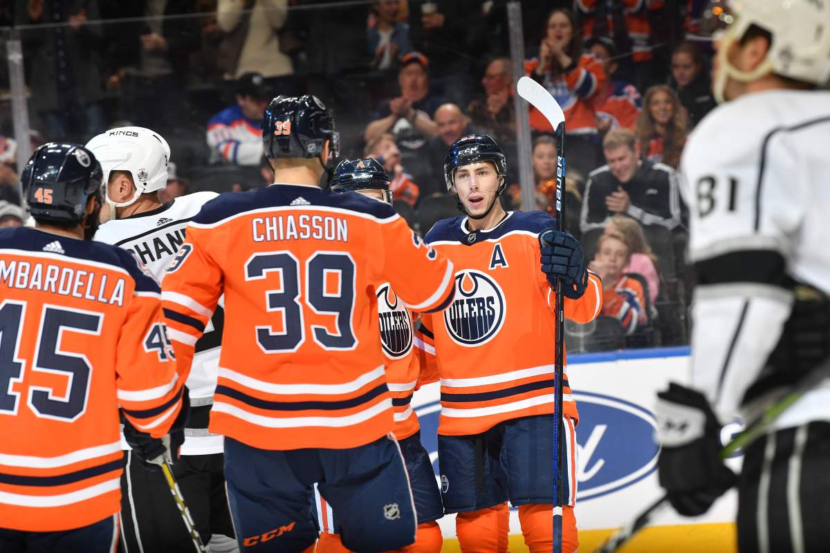 EDMONTON, AB – MARCH 26: Edmonton Oilers center Ryan Nugent-Hopkins (93) celebrates a first period goal with Edmonton Oilers center Joseph Gambardella (45) and Edmonton Oilers right wing Alex Chiasson (39) against the Los Angeles Kings on March 26, 2019 at Rogers Place in Edmonton, Alberta, Canada. (Photo by Andy Devlin/NHLI via Getty Images)