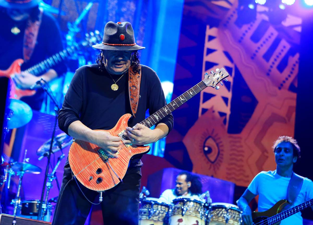 Carlos Santana performs at Sprint Center on Aug. 14, 2014, in Kansas City, Mo.