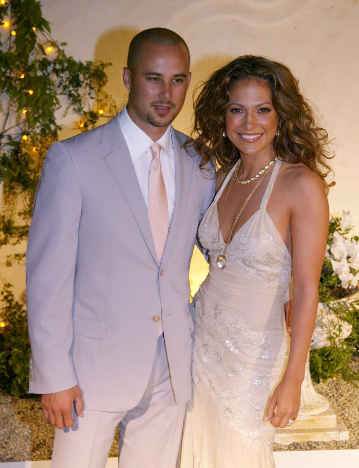 Actress Jennifer Lopez and her husband, dancer Cris Judd, attend the grand opening of her new restaurant Madres on April 12, 2002, in Pasadena, Calif. (Photo by Frazer Harrison/Getty Images)