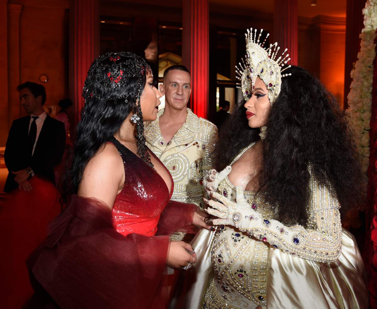 (L-R) Nicki Minaj, designer Jeremy Scott, and Cardi B attend the ‘Heavenly Bodies: Fashion & The Catholic Imagination Costume Institute Gala’ at The Metropolitan Museum of Art on May 7, 2018, in New York City.