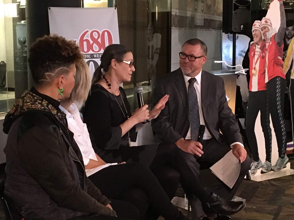 CJOB's Kelly Moore chats with Olympians Susan Auch, Michelle Sawatzky-Koop, and Wanda Guenette at the launch of a new exhibit celebrating women in sport.