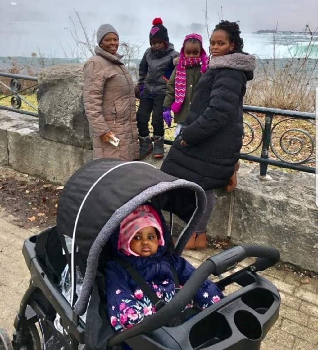 Infant Rubi Pauls, along with her family Ann Wangui Karanja, Carolyne Karanja, and Ryan and Kerri Pauls .