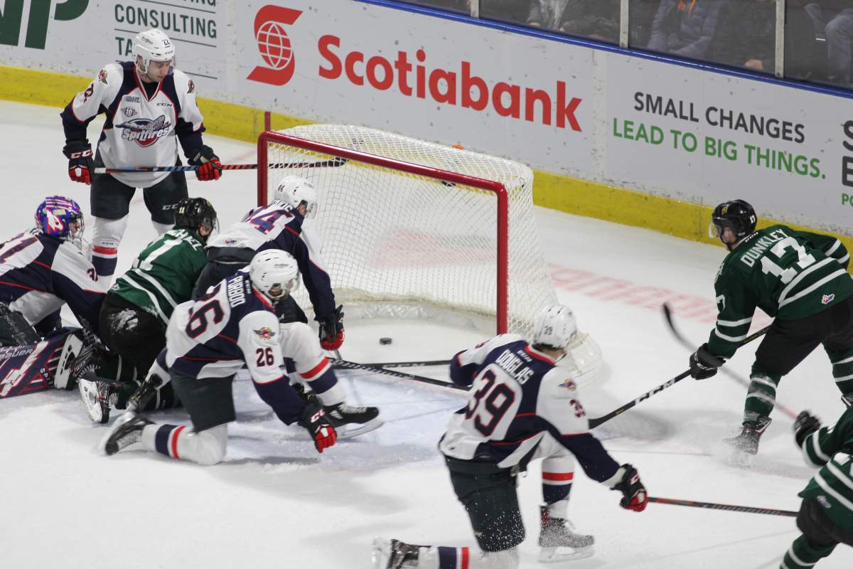 Nathan Dunkley scores the second of his two goals for the London Knights in a 5-0 win in Game 2 of their opening-round series against the Windsor Spitfires.