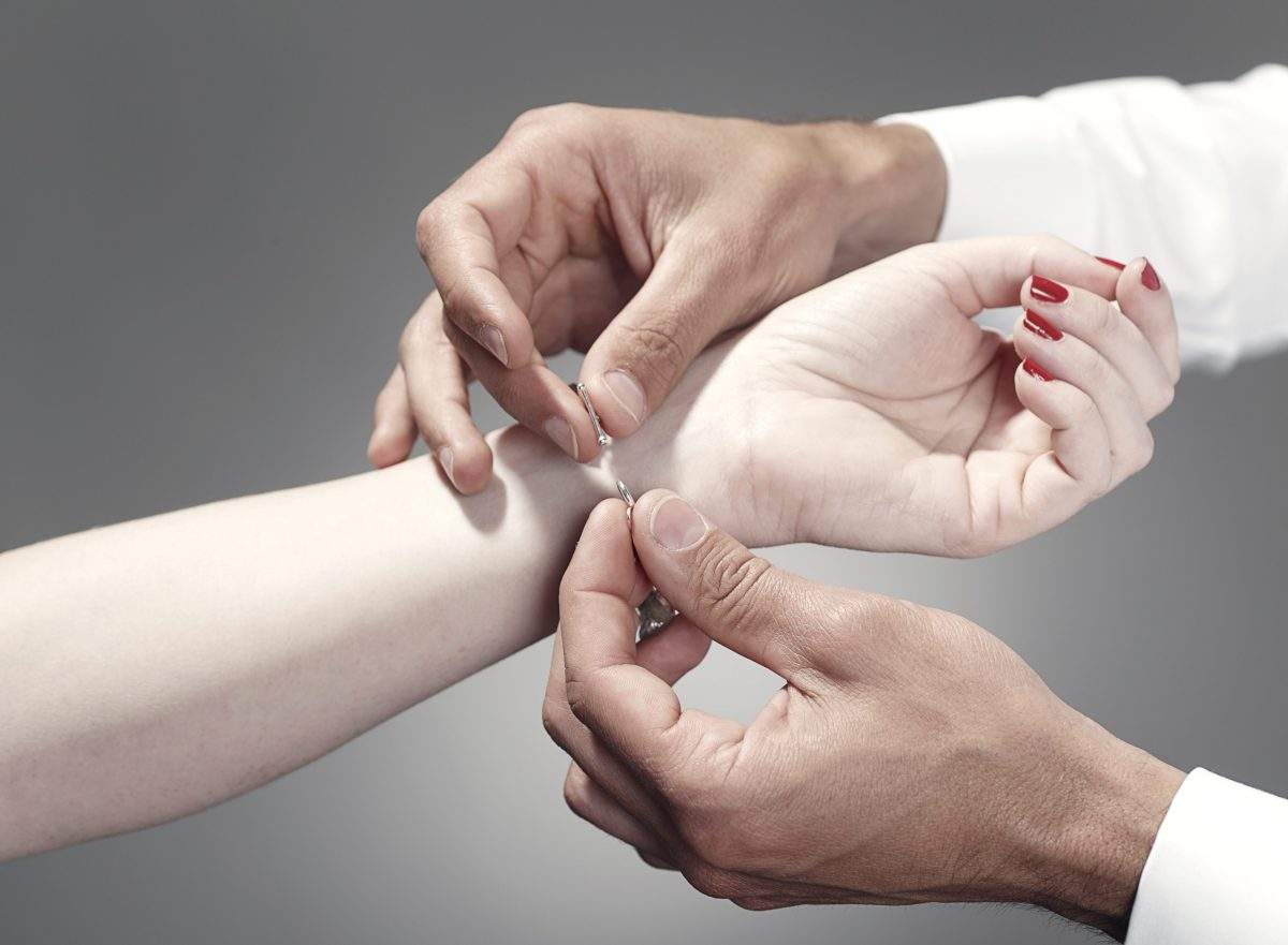 A file image of a bracelet being placed on a wrist. Multiple police departments in the Lower Mainland are reporting a spike in jewelry thefts against seniors being done through distraction.