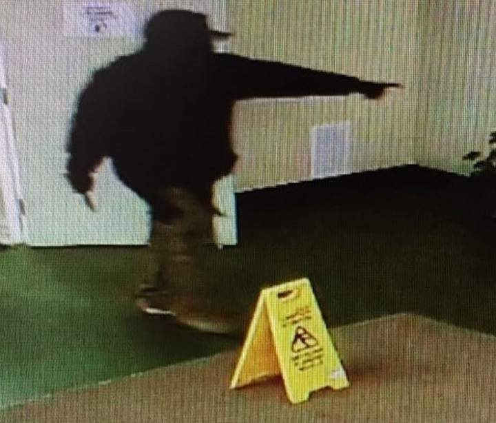 Police say the suspect who was armed with a knife had a piercing under his eye.