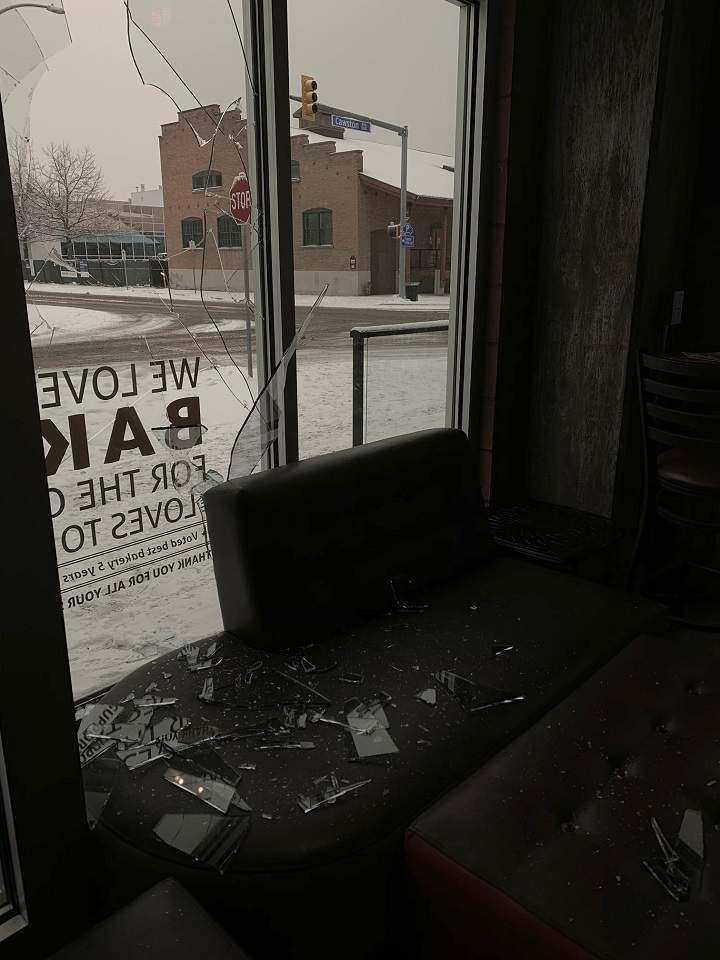 An inside look at the broken window, and shards of glass, at Bliss Bakery in Kelowna.