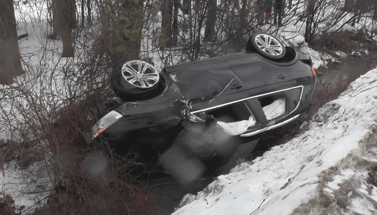 One man has been taken to hospital after his car landed in a ditch in Peterborough.