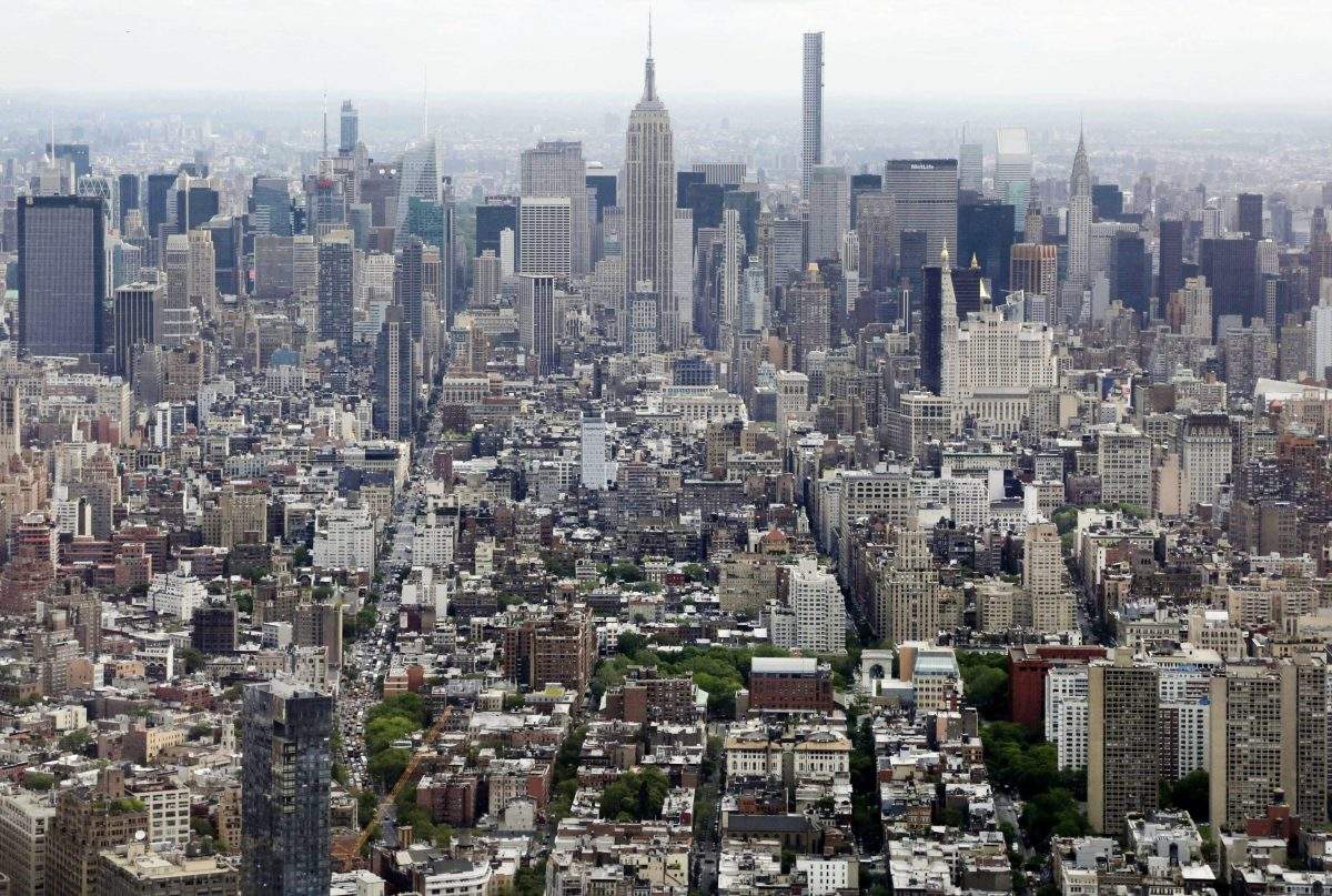 In this May 20, 2015, file photo, Midtown Manhattan, including the Empire State Building, center, is seen from the observatory at One World Trade Center in New York. 
