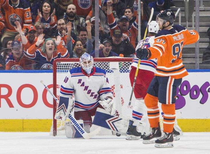 New York Rangers goaltender Alexandar Georgiev (40) reacts after allowing a goal by Edmonton Oilers Connor McDavid (97) during first period NHL hockey action in Edmonton, Alta., on Monday March 11, 2019.