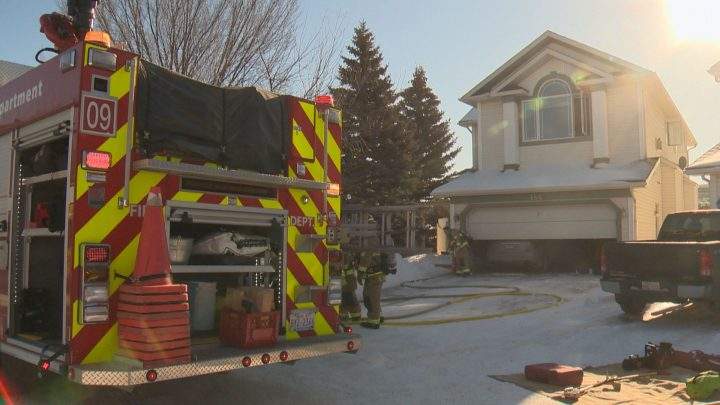 Calgary fire crews on the scene of a basement fire in Riverbend on Tuesday, March 5.