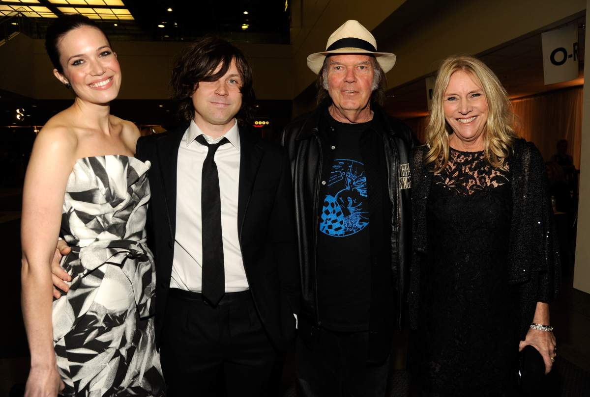(L-R) Mandy Moore, Ryan Adams, Neil Young and Pegi Young attend The 2012 MusiCares Person Of The Year Gala Honouring Paul McCartney at Los Angeles Convention Center on Feb. 10, 2012, in Los Angeles, Calif.