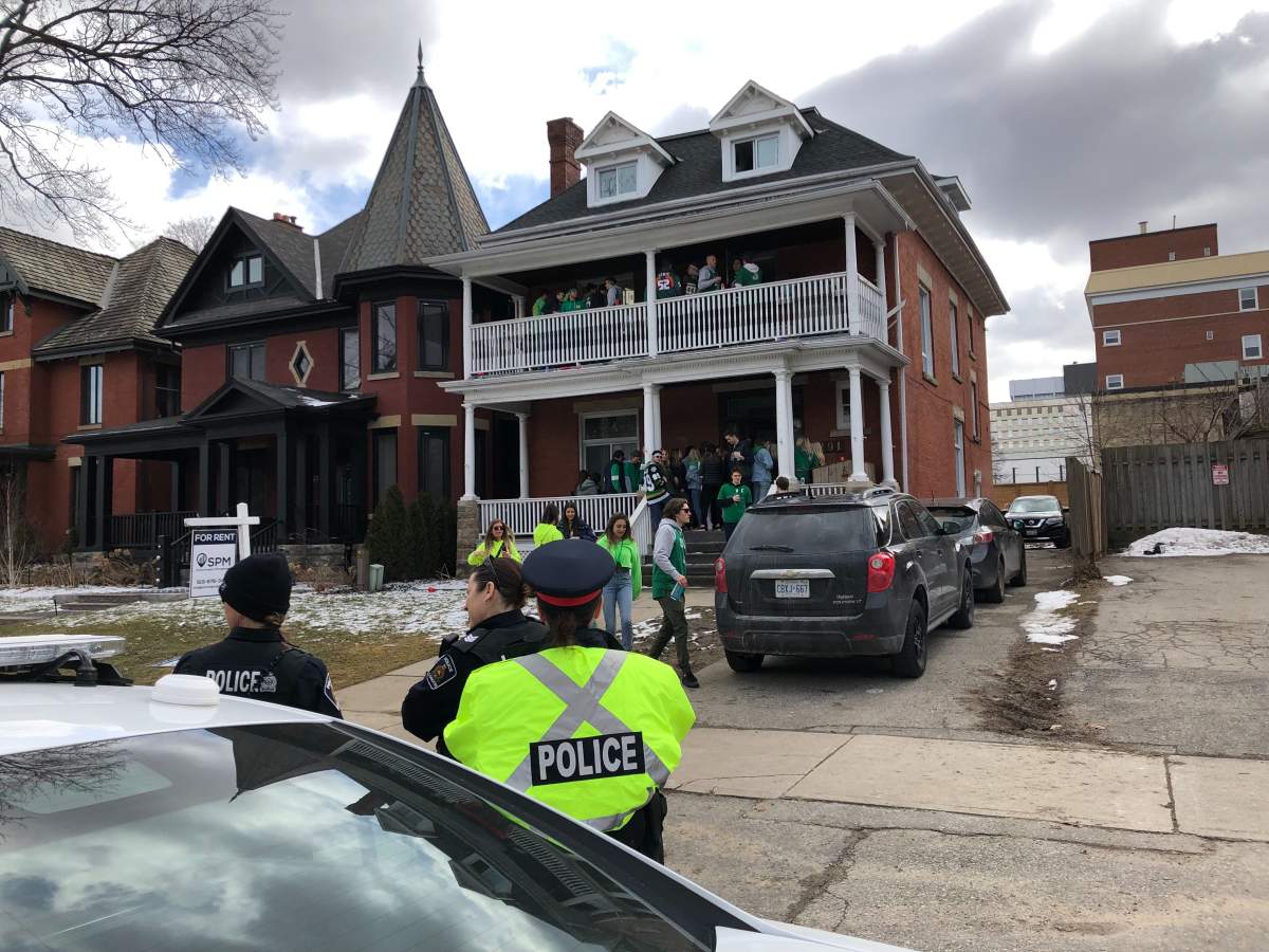 London police attend a St. Patrick's Day house party on Central Ave.