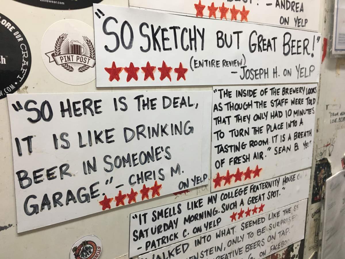 Reviews of Storm Brewing, many of them humorous, posted inside the brewery.