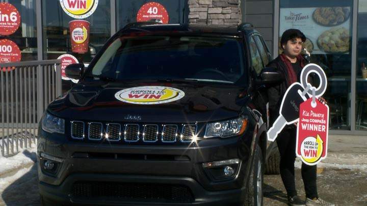 Saskatoon's Kia Powery won a new 2019 Jeep Compass compact SUV after rolling up the rim on her Tim Hortons cup.