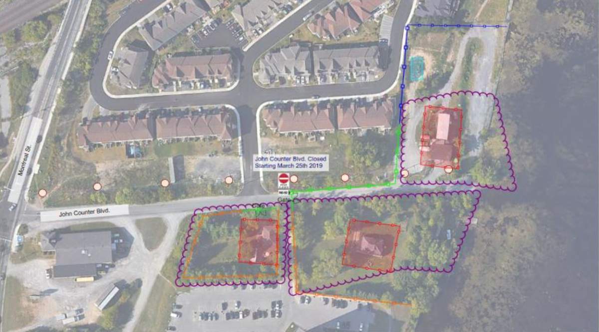 The red shaded properties will be demolished to make room for the bridge landing point on the west shore.