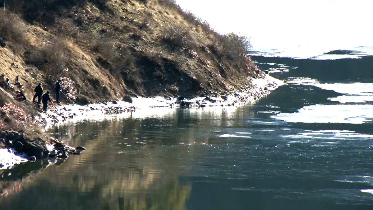 Search crews work from the banks of the Pend Oreille River on Tuesday.