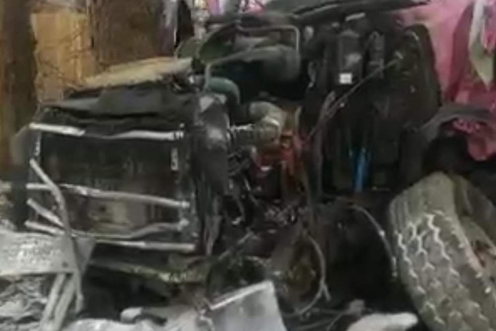 The OPP say a flatbed truck hauling a vehicle was heading westbound on Highway 403 when a mechanical failure sent the truck off the road.