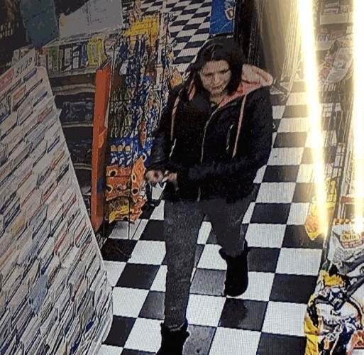 Hamilton police are looking for the woman in this surveillance photo as they try to find a missing man.