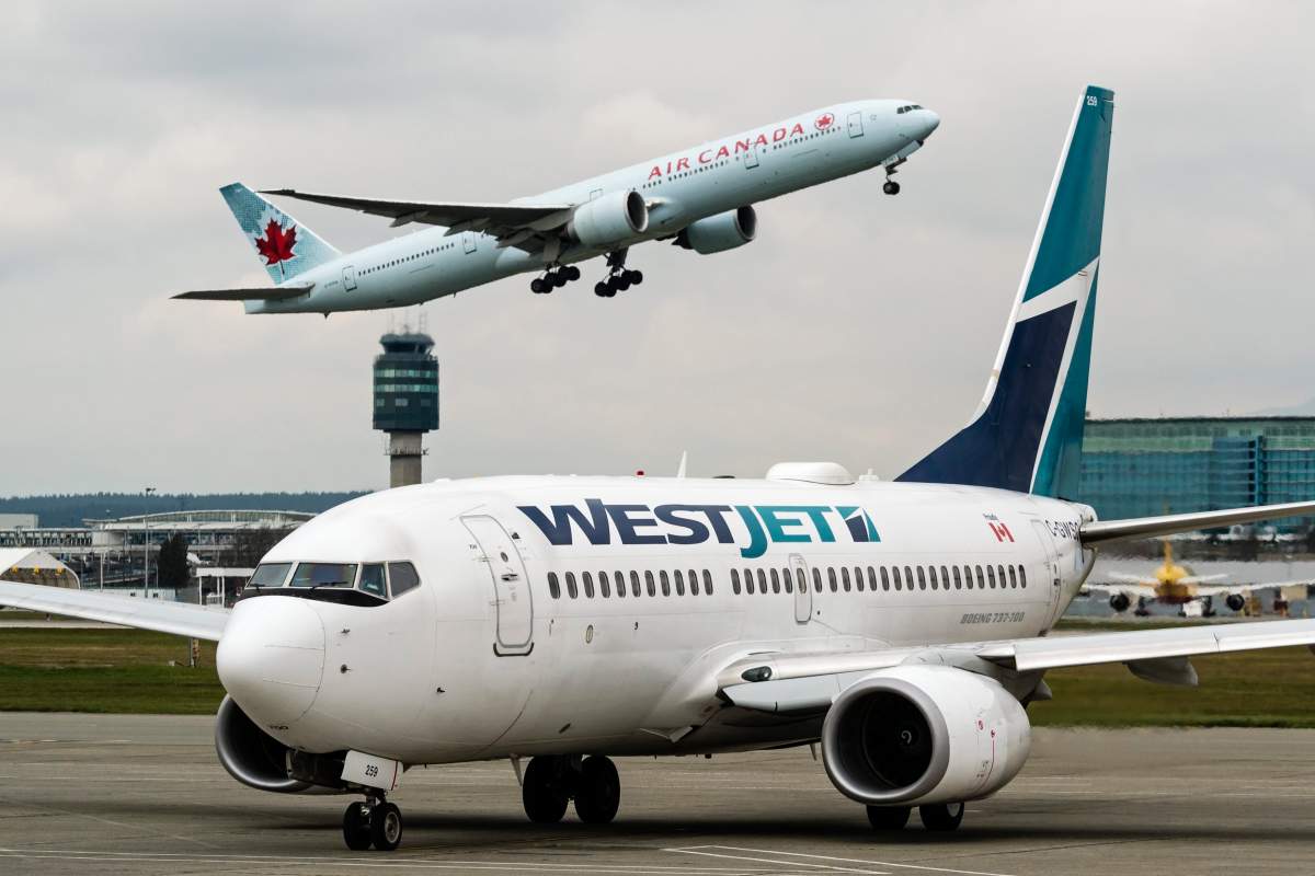 Air Canada and WestJet planes at the Vancouver International Airport.