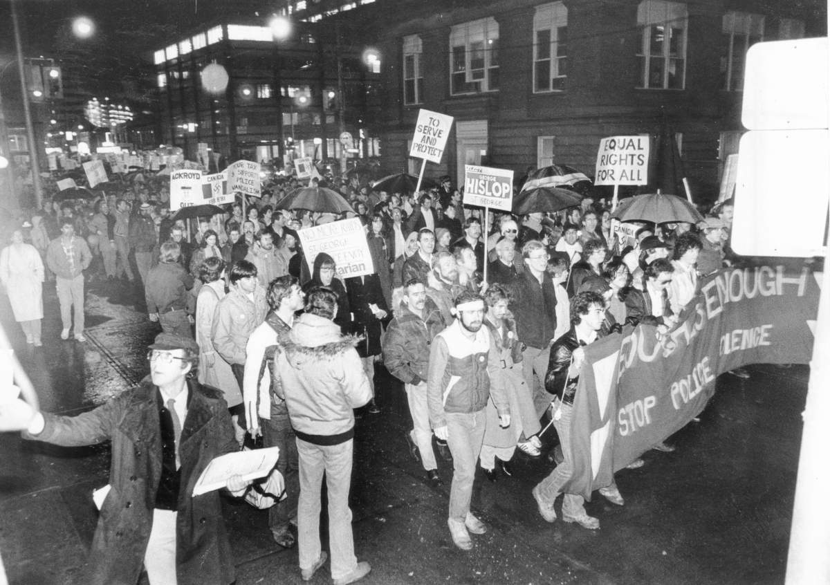 Gay rights supporters march on Dundas Street in Toronto on their way to 52 Division police station from Queen’s Park. Originally published on Feb. 21, 1981.