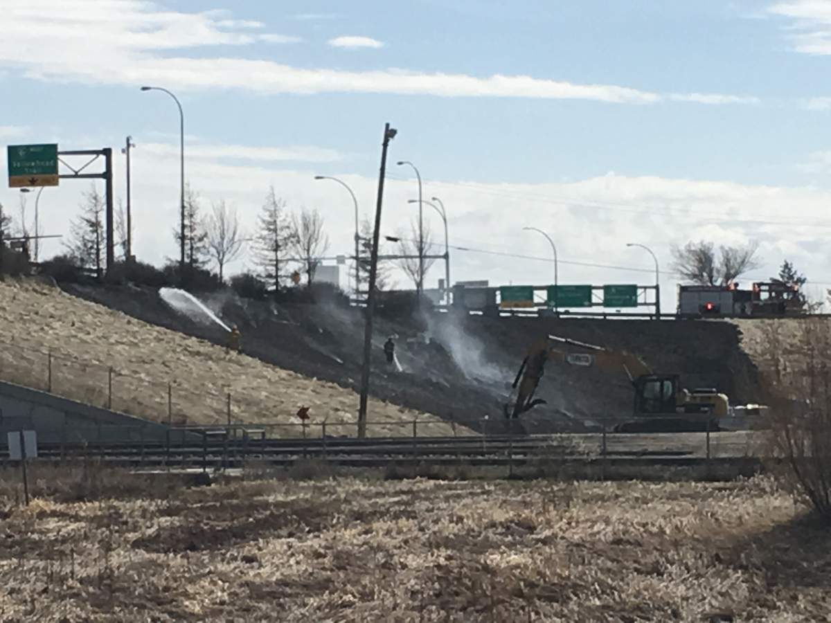 A grass fire near Yellowhead Trail and 156 Street on April 23, 2019.