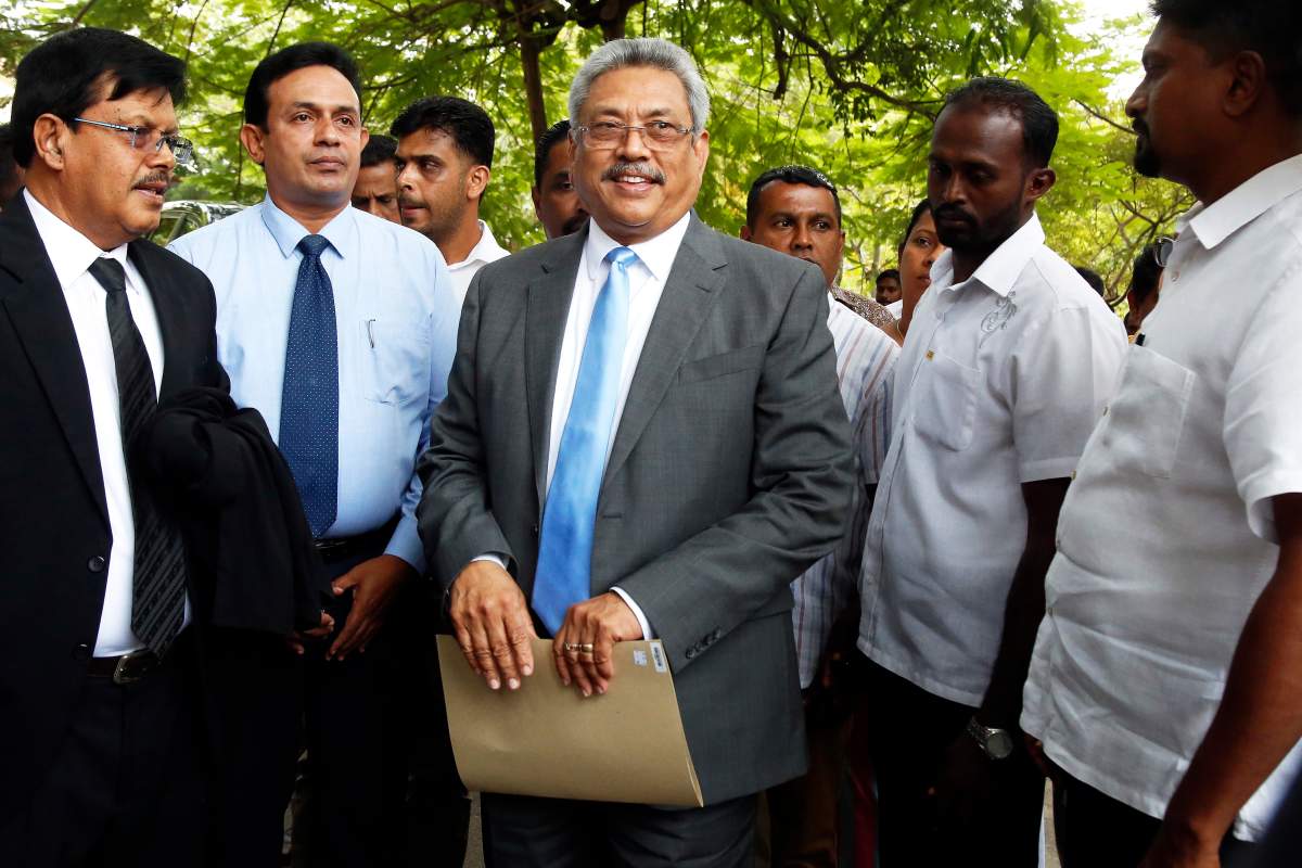 Sri Lankas former Secretary of Defence, Gotabaya Rajapaksa, centre) flanked by his security escorts as he arrives at the Special High Court in Colombo, Sri Lanka, 10 September 2018. EPA/M.A.PUSHPA KUMARA