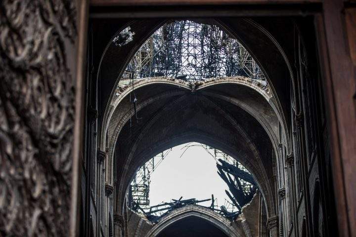 A view of the damaged roof inside Notre Dame de Paris in the aftermath of a fire.