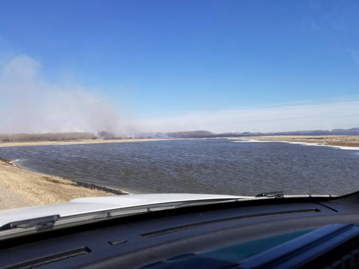 Saskatoon and area firefighters battle blaze on Highway 14 and Range Road 3074 on Saturday afternoon.