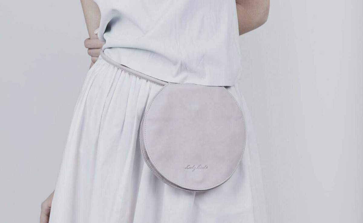 This February 2018 photo provided by Etsy seller Lady Birdesign shows a model wearing a Bridal Fanny Pack in Tel Aviv, Israel.