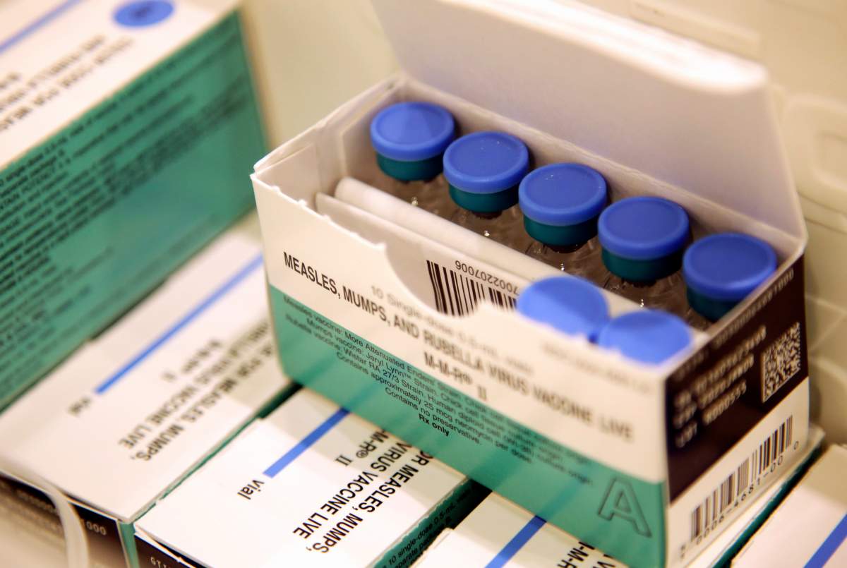 FILE- In this March 27, 2019, file photo, measles, mumps and rubella vaccines sit in a cooler at the Rockland County Health Department in Pomona, N.Y.
