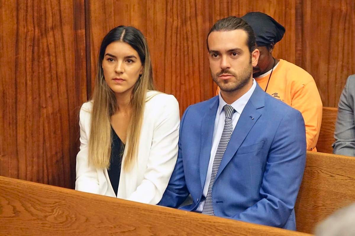 Mexican soap opera star Pablo Lyle, right, and his wife Ana Araujo wait before appearing in Miami-Dade, Fla., circuit court on Monday, April 8, 2019. A Florida judge has set bail at $50,000 and ordered house arrest for Pablo Lyle who is accused of punching a man who later died.