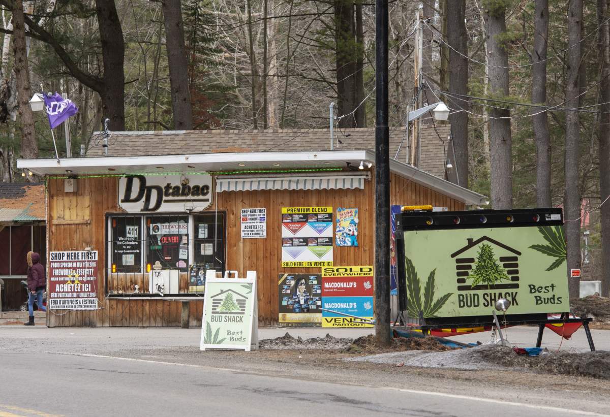 A cannabis store and a tobbaco shop are seen Friday, April 12, 2019 in the Mohawk territory of Kanesatake, Que north of Montreal.
