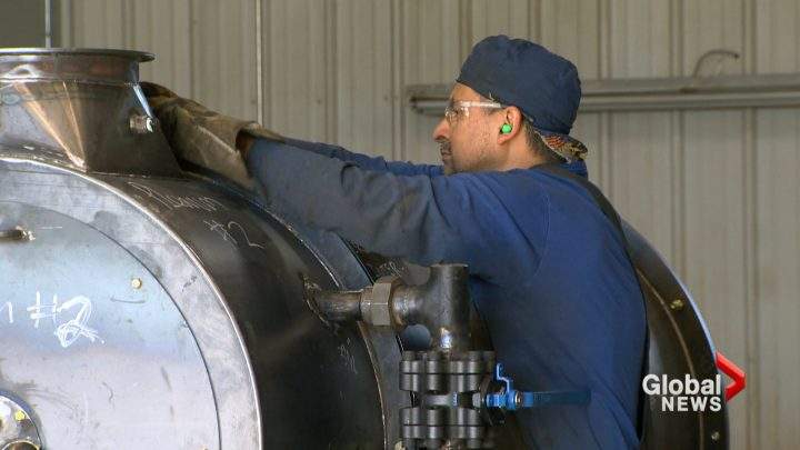 An employee of Red Deer, AB based GenTex works on the shop floor. The company once employed 50 people, 12 employees remain. 