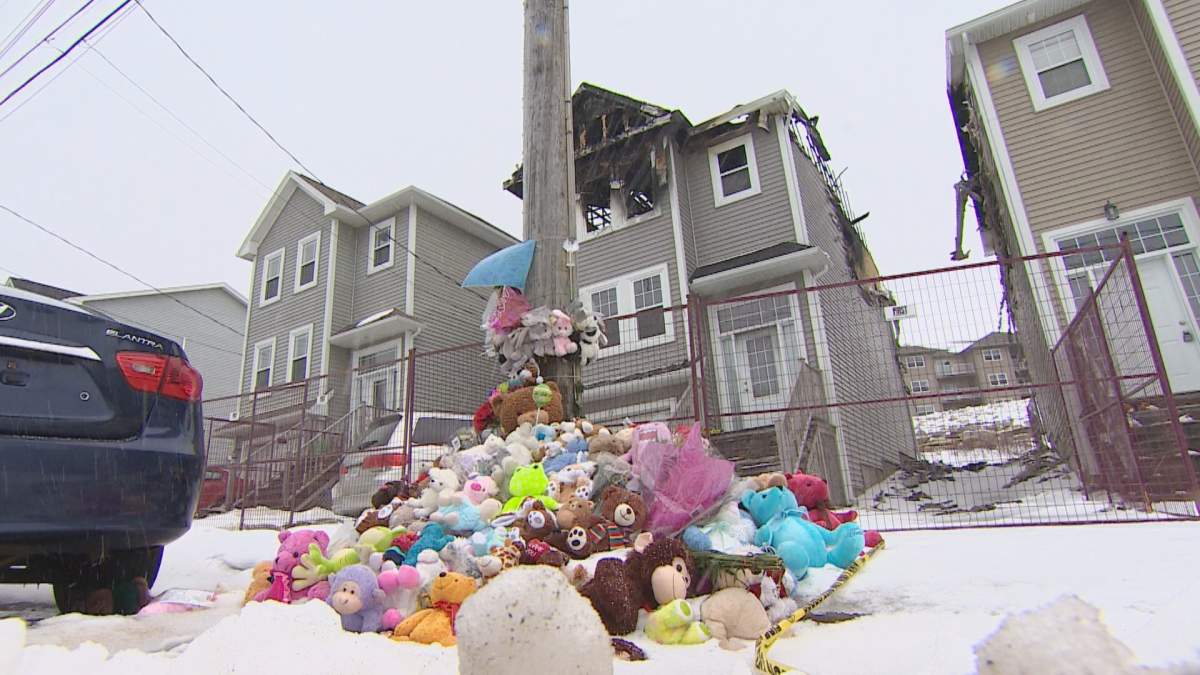 FILE – A makeshift memorial for the Barho family is seen outside their Halifax home following a devastating fire that killed seven children.