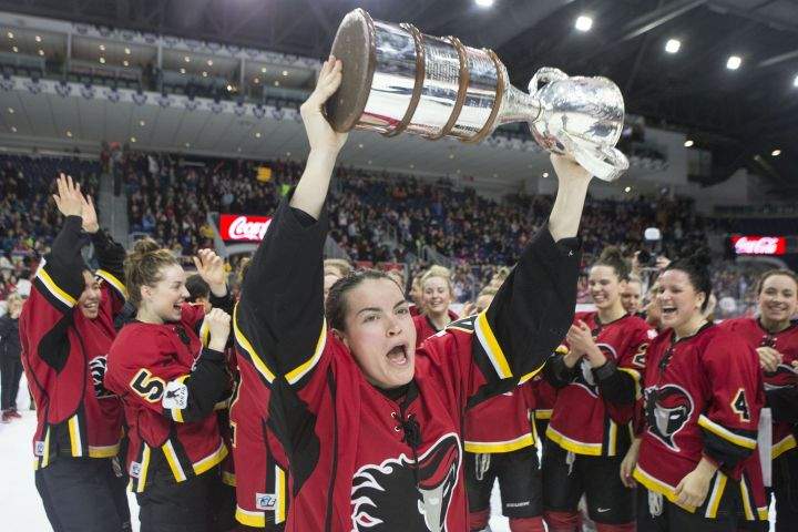 Calgary Inferno’s Blayre Turnbull hoists the trophy after her team beat Les Canadiennes de Montreal 5-2 to win the 2019 Clarkson Cup game in Toronto, on Sunday, March 24 , 2019. As their league’s trophies and jerseys were getting sold off, the Calgary Inferno’s championship season was celebrated Monday when Calgary’s mayor proclaimed it “Calgary Inferno Day.”