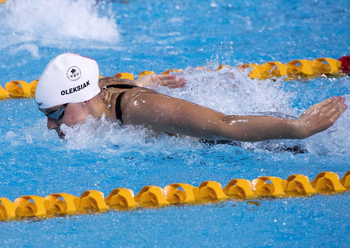 Canada's Penny Oleksiak swims to a second place finish in her semifinal for the women's 11m butterfly during swimming finals at the Commonwealth Games in Gold Coast, Australia, on April 5, 2018. 
