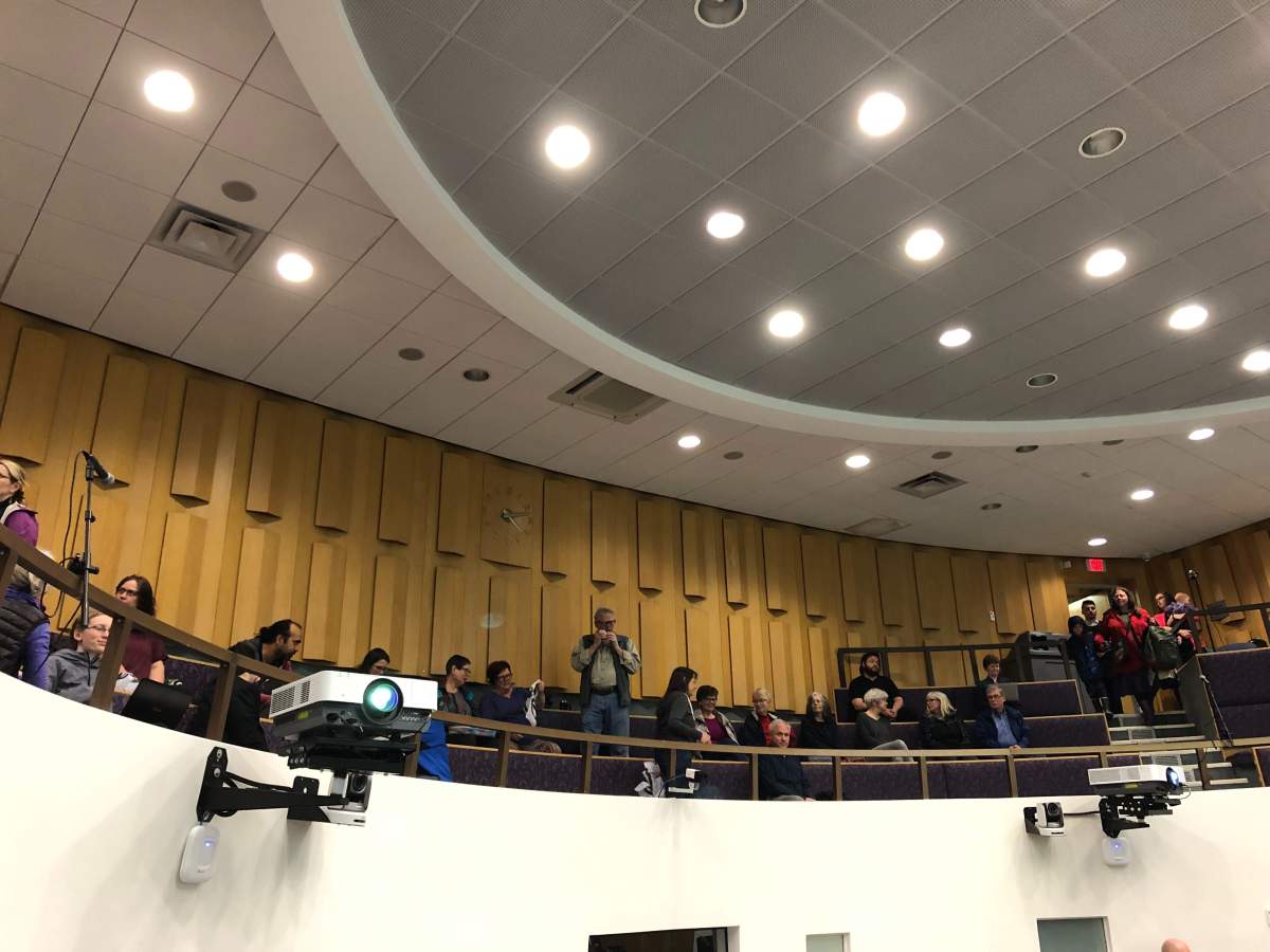 Londoners fill the gallery of council chambers, awaiting a vote from councillors that will decide whether or not London declares a climate emergency.