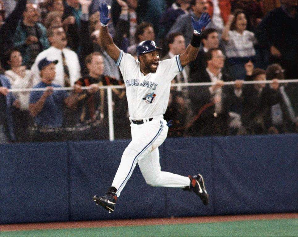 Toronto Blue Jays’ Joe Carter celebrates his game-winning three-run home run in the ninth inning of Game 6 of the World Series against the Philadelphia Phillies in Toronto, Oct. 23, 1993. THE CANADIAN PRESS/AP/Mark Duncan