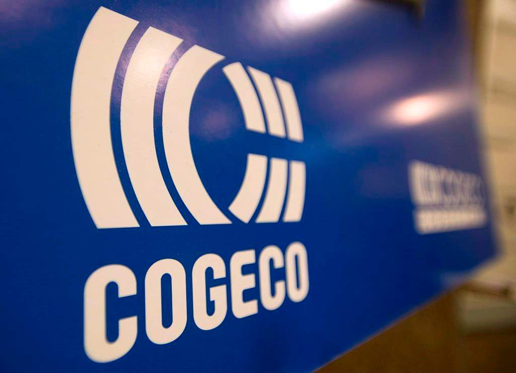 A Cogeco sign hangs at the company's annual general meeting in Montreal, Tuesday, January 14, 2014.