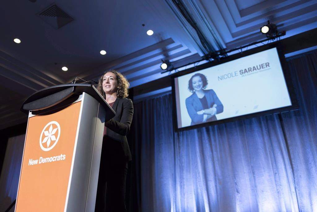 NDP MLA Nicole Sarauer speaks during the Saskatchewan New Democrats leadership convention at the Delta Hotel in Regina, Saskatchewan on Saturday March 3, 2018. THE CANADIAN PRESS/Michael Bell.