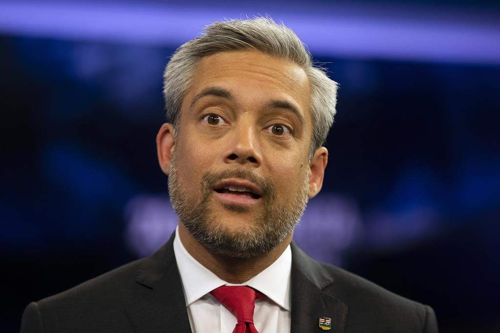 Alberta Liberal Party leader David Khan speaks to the media after the 2019 Alberta Leaders Debate in Edmonton, Alta., on Thursday, April 4, 2019. Alberta's Liberal party released its full policy platform Monday with a plan for job creation, stronger public services and a new sales tax. Liberal Leader David Khan says the platform is focused on solutions. THE CANADIAN PRESS/Codie McLachlan.