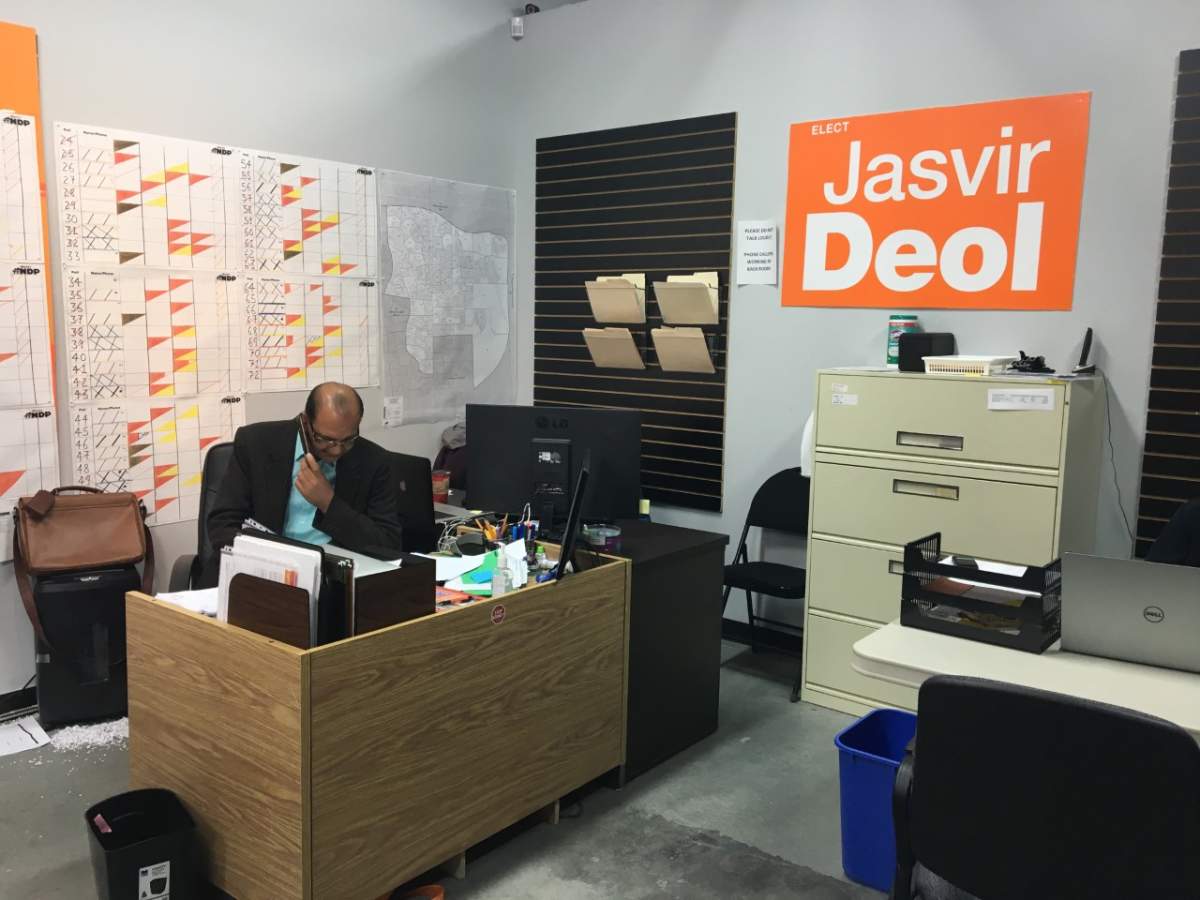 Edmonton-Meadows NDP candidate,Jasvir Deol, speaks to potential voters.