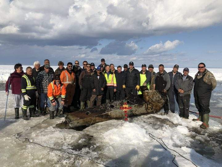 The first pontoon from the plane was recovered with help from local residents.