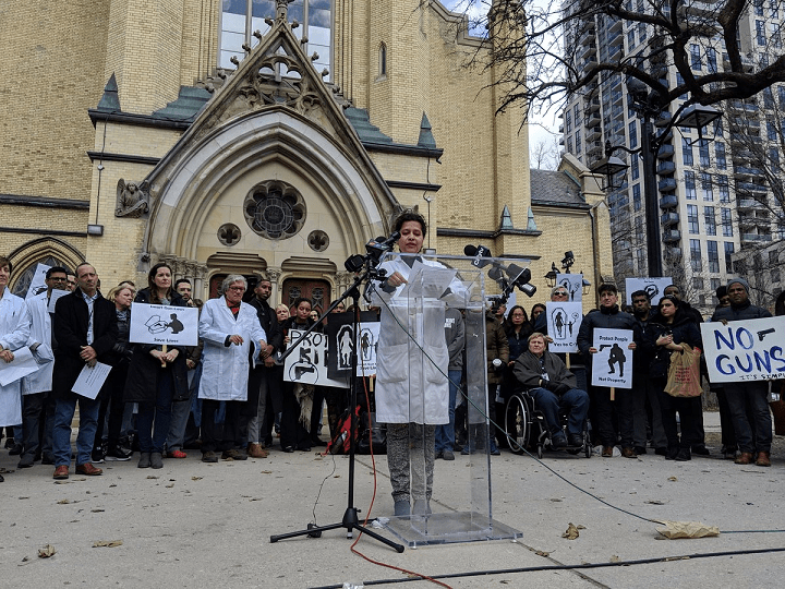 Dr. Najma Ahmed speaking to health-care professionals at a Toronto rally in favour of gun control on Wednesday.