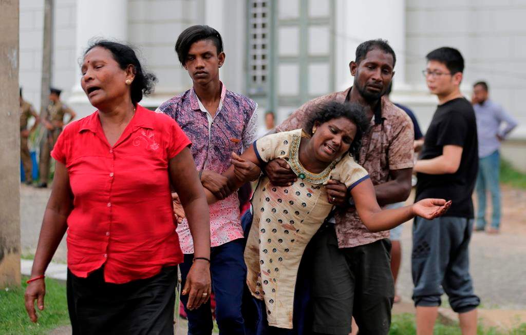 Relatives of a blast victim grieve outside a morgue in Colombo, Sri Lanka, Sunday, April 21, 2019. (AP Photo/Eranga Jayawardena)