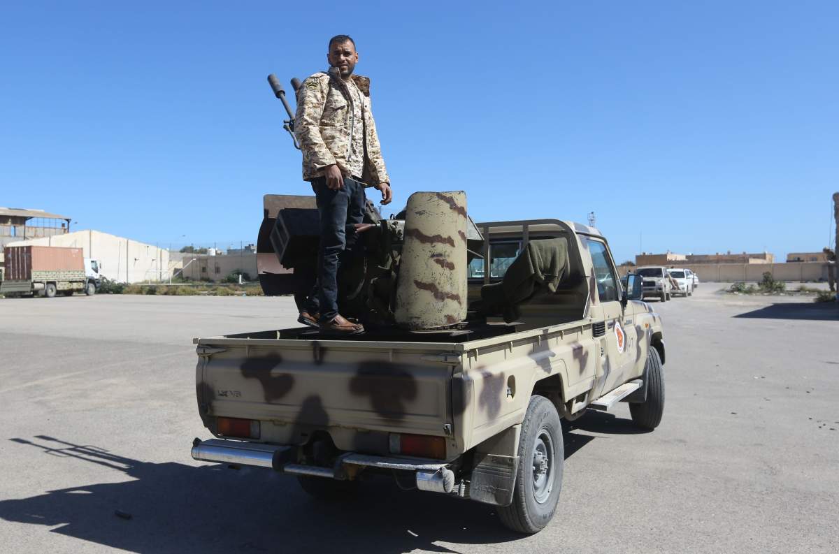Fighters from a Misrata armed group loyal to the internationally recognised Libyan Government of National Accord (GNA) prepare their ammunition before heading to the frontline as battles against Forces of Libyan strongman Khalifa Haftar.