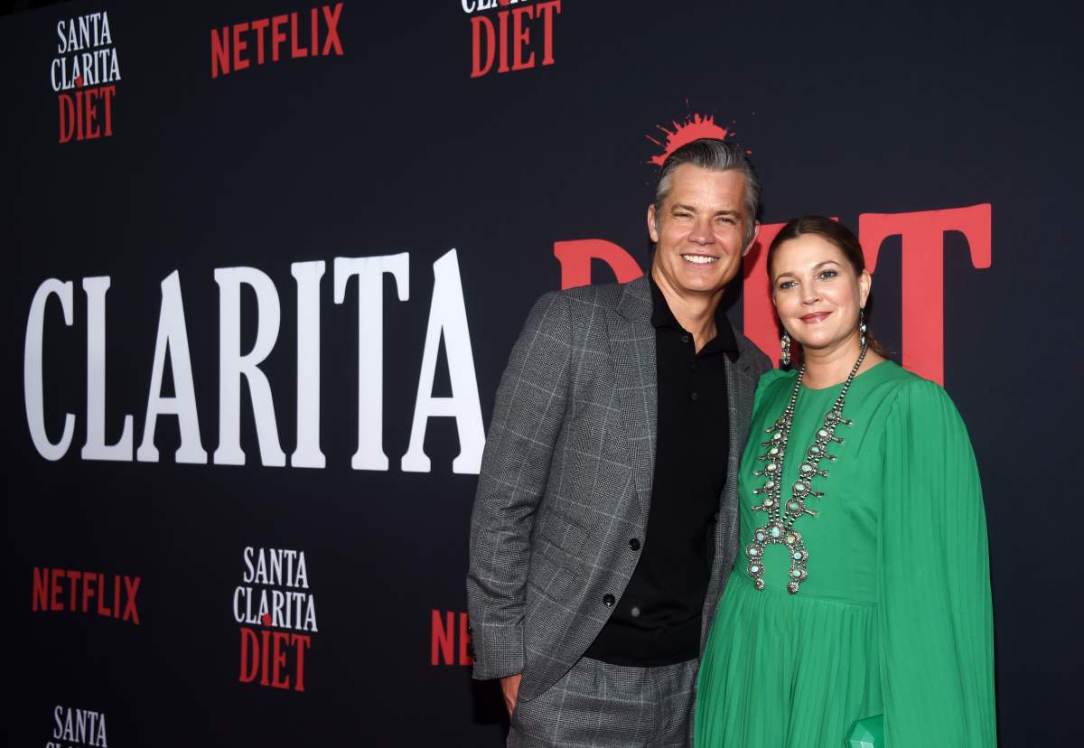 Timothy Olyphant (L) and Drew Barrymore arrive at Netflix's 'Santa Clarita Diet' Season 3 premiere at Hollywood Post 43 on March 28, 2019 in Los Angeles, Calif. 