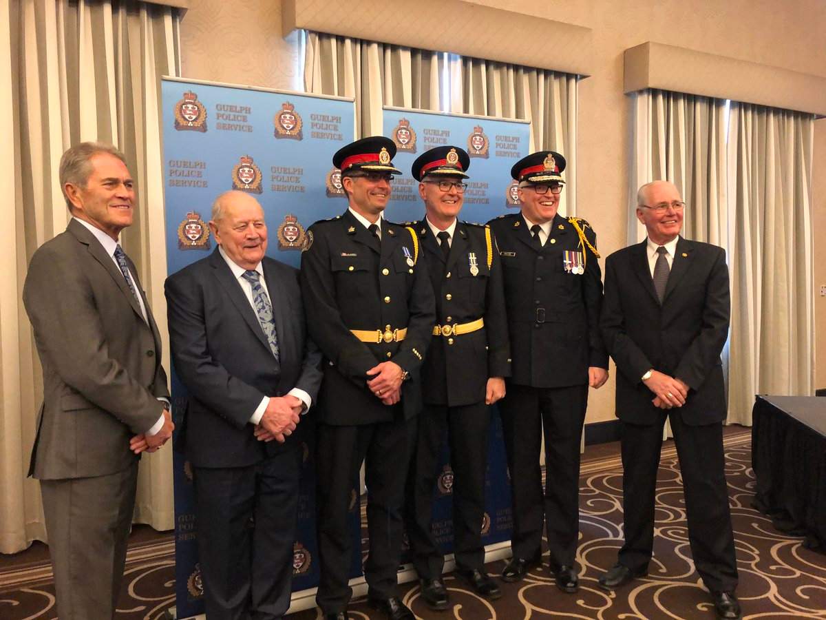 Guelph Police Chief Gordon Cobey poses with the city's past police chief. (L-R) Rob Davis, Bill McCart, Gordon Cobey, Jeff DeRuyter, Bryan Larkin and Richard Stewart.