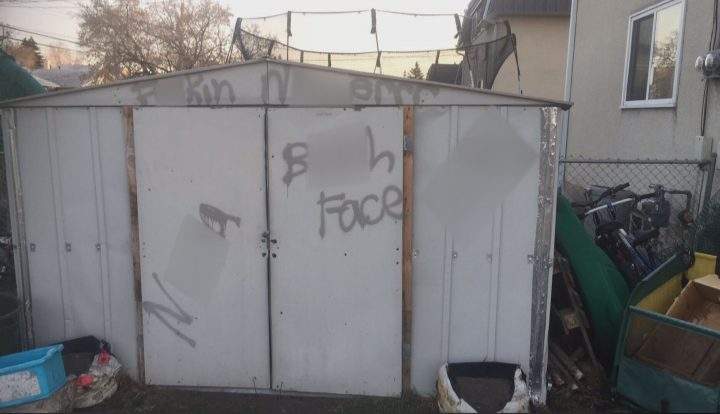 A shed was spray-painted with racial slurs in the community of Ogden on Saturday.