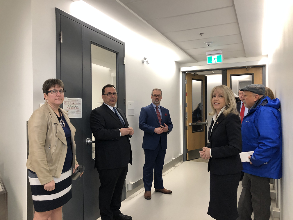Minister of Training, Colleges and Universities Merrilee Fullerton is given a tour of the existing Fusion Pharmaceuticals facilities at McMaster Innovation Park.